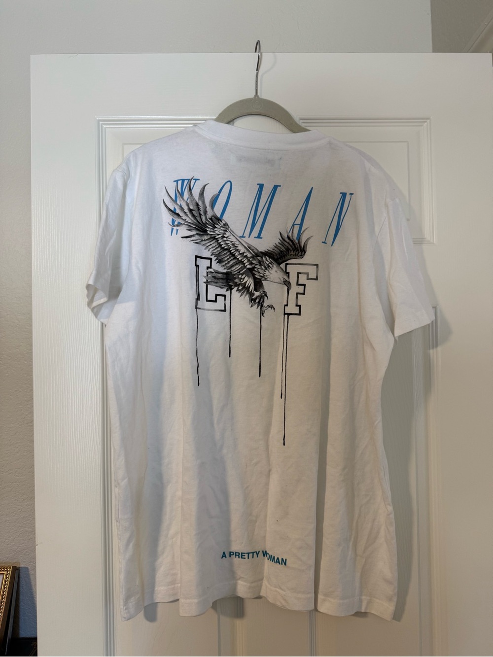 Off-White White Short Sleeve Tee with Eagle Back Graphic and Blue Accents